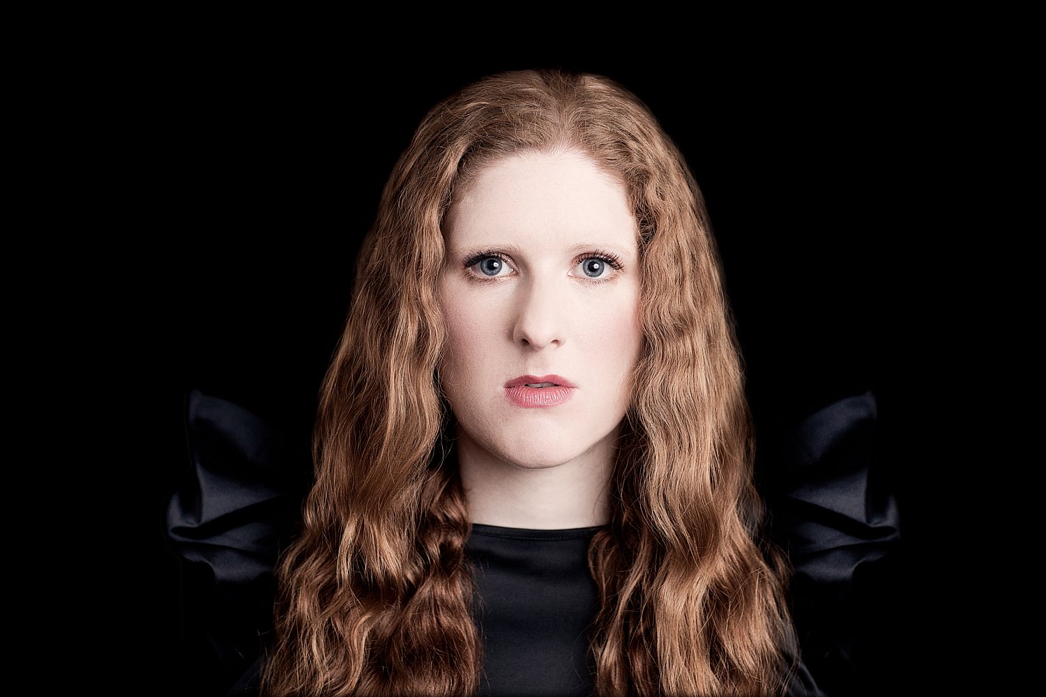 red-head-female-composer-cheryl-frances-hoad-portrait-on-black-ruffles-sleeves-mat-smith-photography.jpg