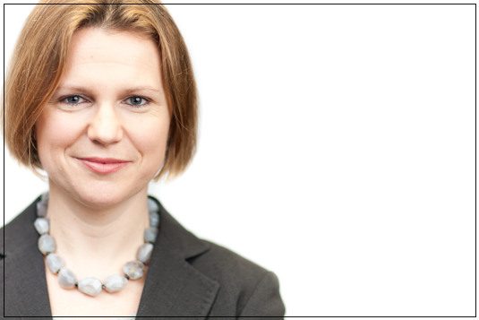 Businesswoman, corporate headshot with a single off-camera flash, London