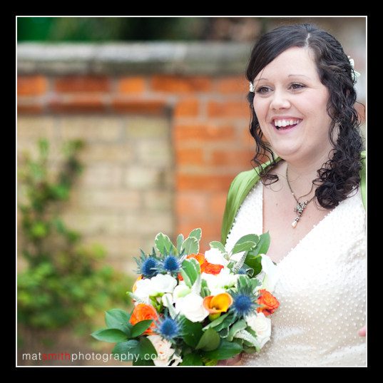 Anna smiling with flowers