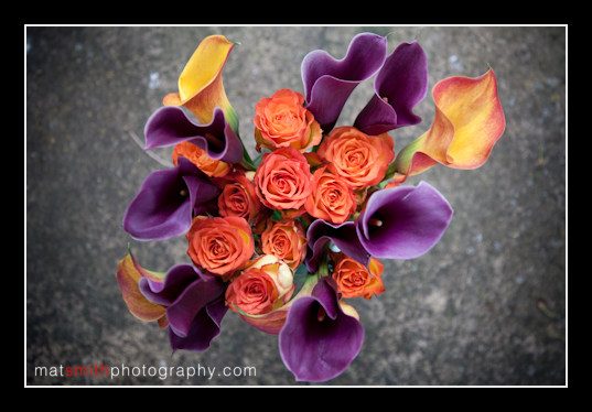 Wedding flowers laid on stone at Anna and Ross's wedding, Bredon Hardwick, Gloucestershire