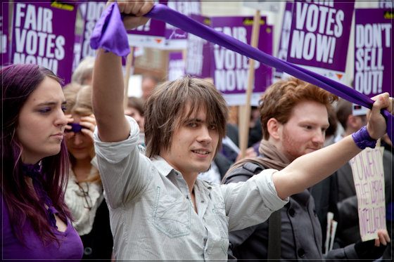 Protester in a purple scarf at the electoral reform demonstration, Palmer Street, London