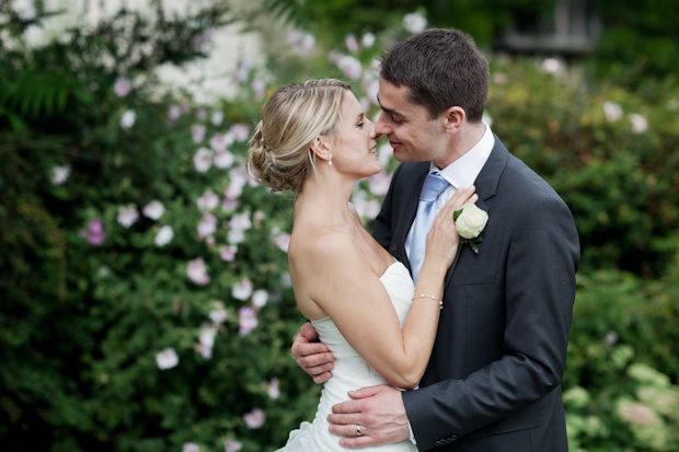 Rebecca and Edwin kiss by the blossom, Wonersh, Surrey