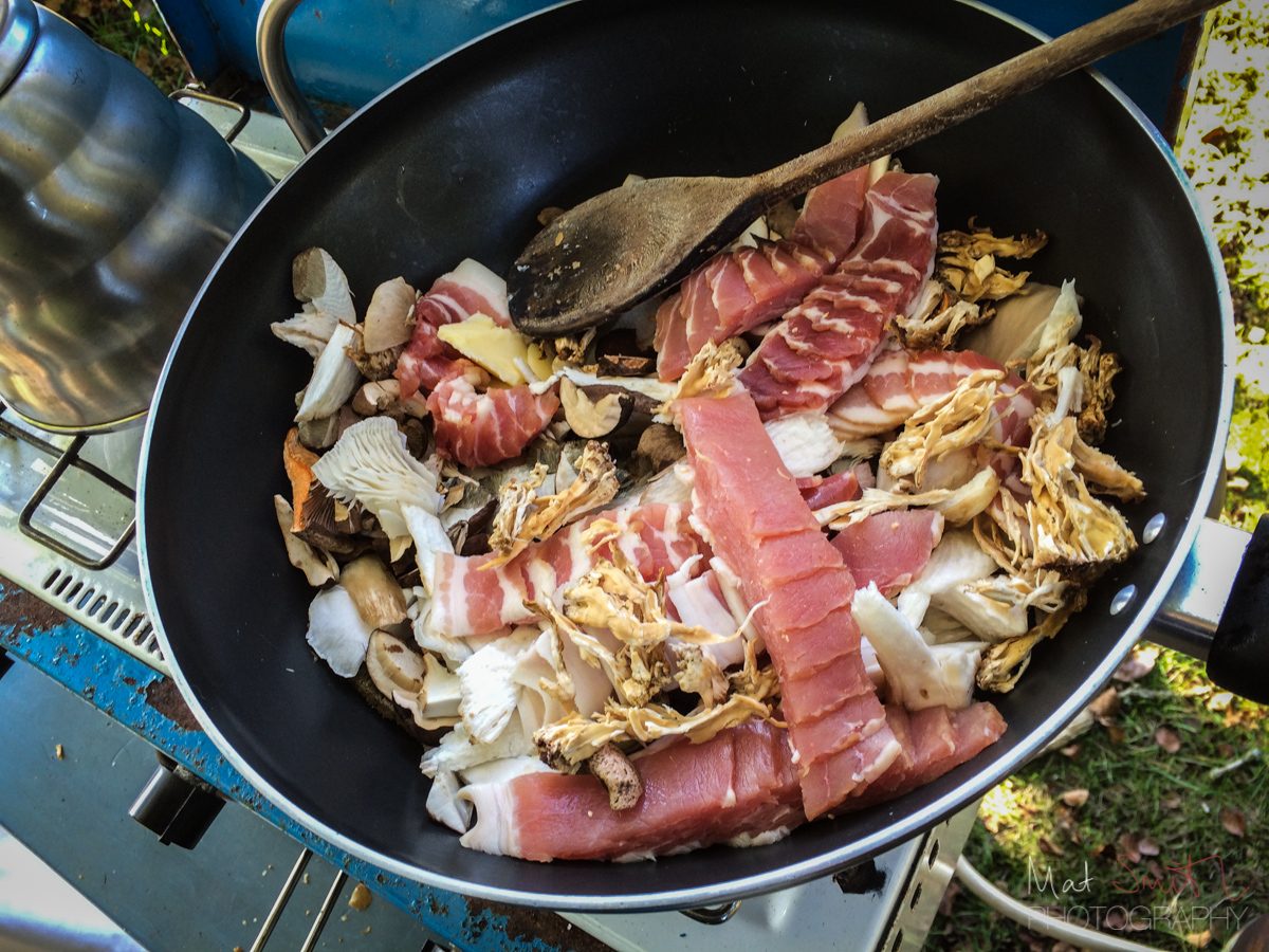 Camping breakfast of smoked streaky bacon and mushrooms, New Forest