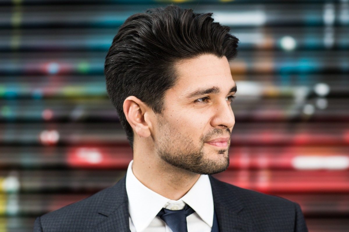 Maddox Magic in a suit and tie, portrait by Mat Smith Photography, Brick Lane