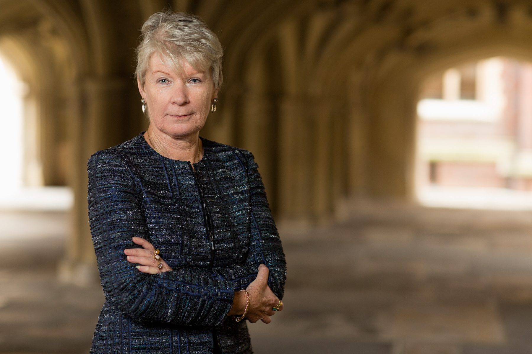 Mary Kerr, Under Treasurer, in the cloisters, portrait by Mat Smith Photography, London
