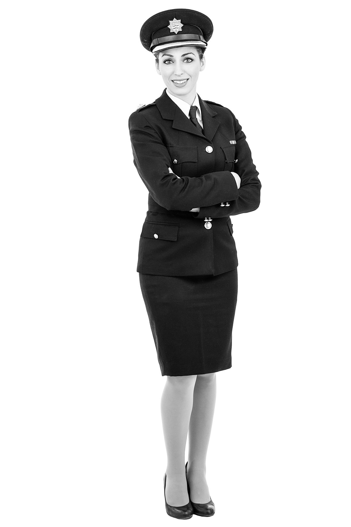 Dr Sabrina Cohen-Hatton in fire brigade uniform on white, portrait by Mat Smith Photography, Chiswick