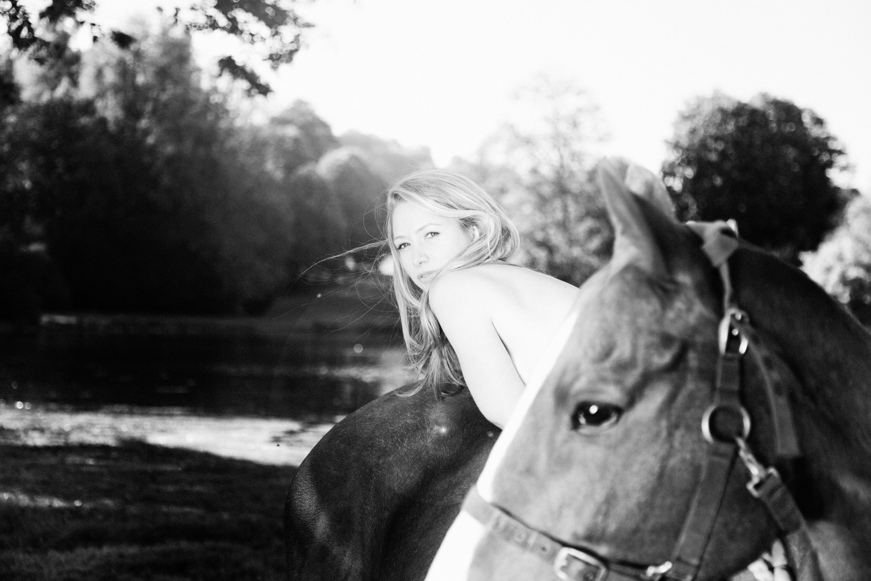 Miss June with a horse, from a polo club calendar shoot