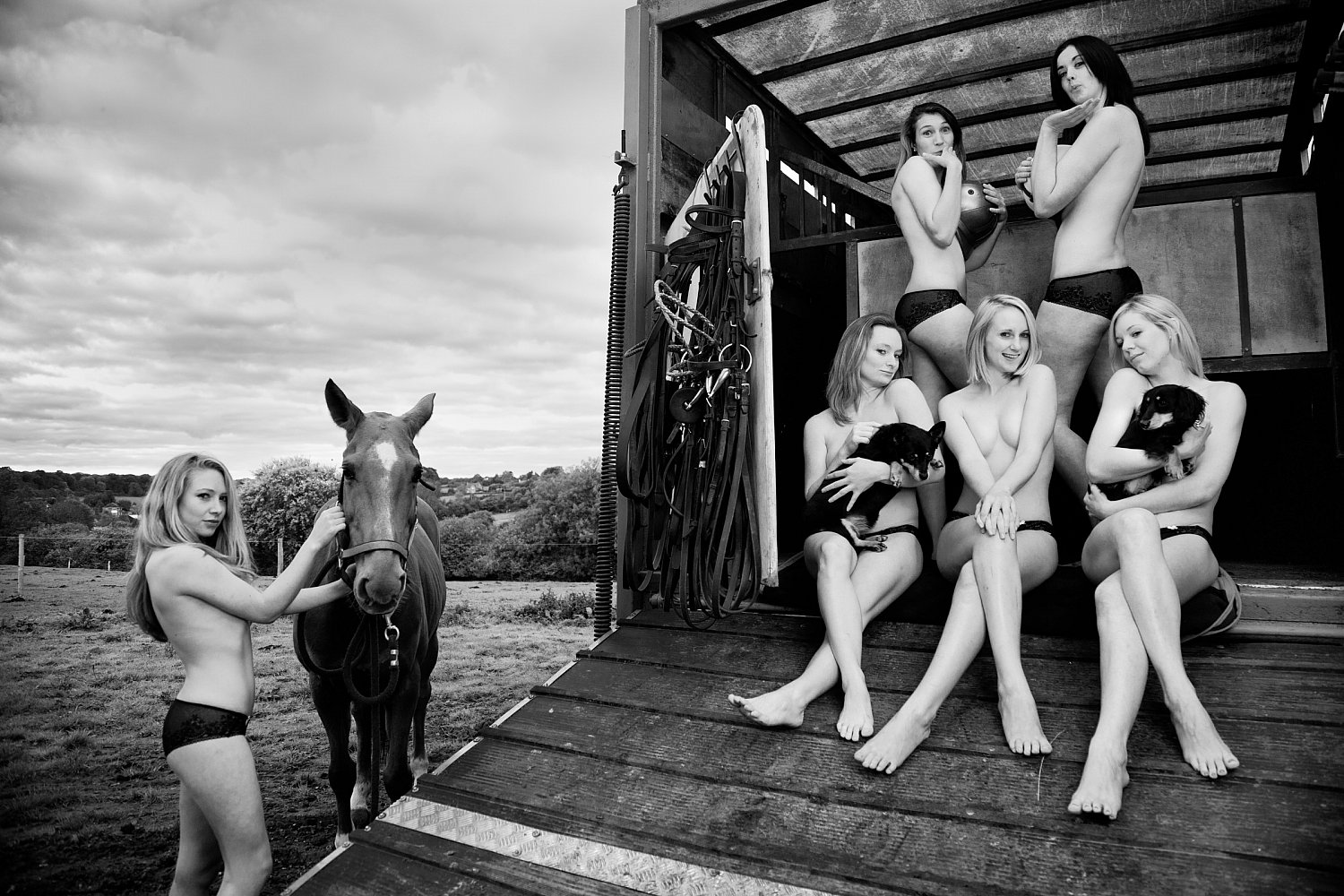 Polo club charity calendar shoot in a horse box