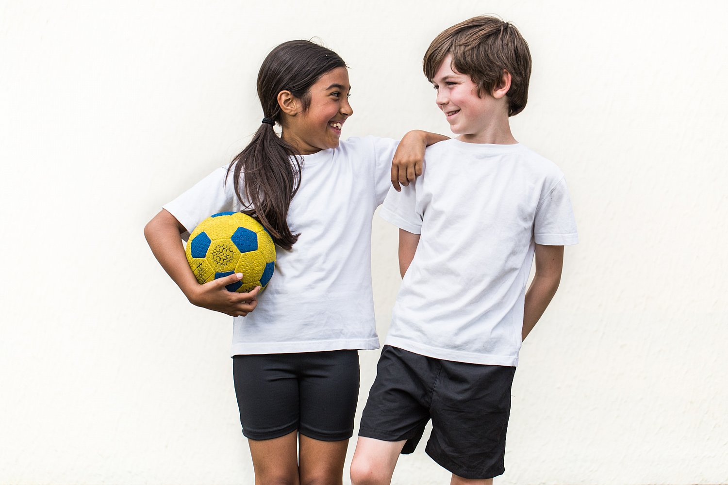 Studio-style sports portrait of a pupil in PE kit