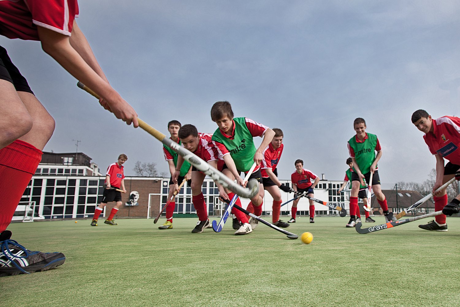 Pupil playing hockey for the school team