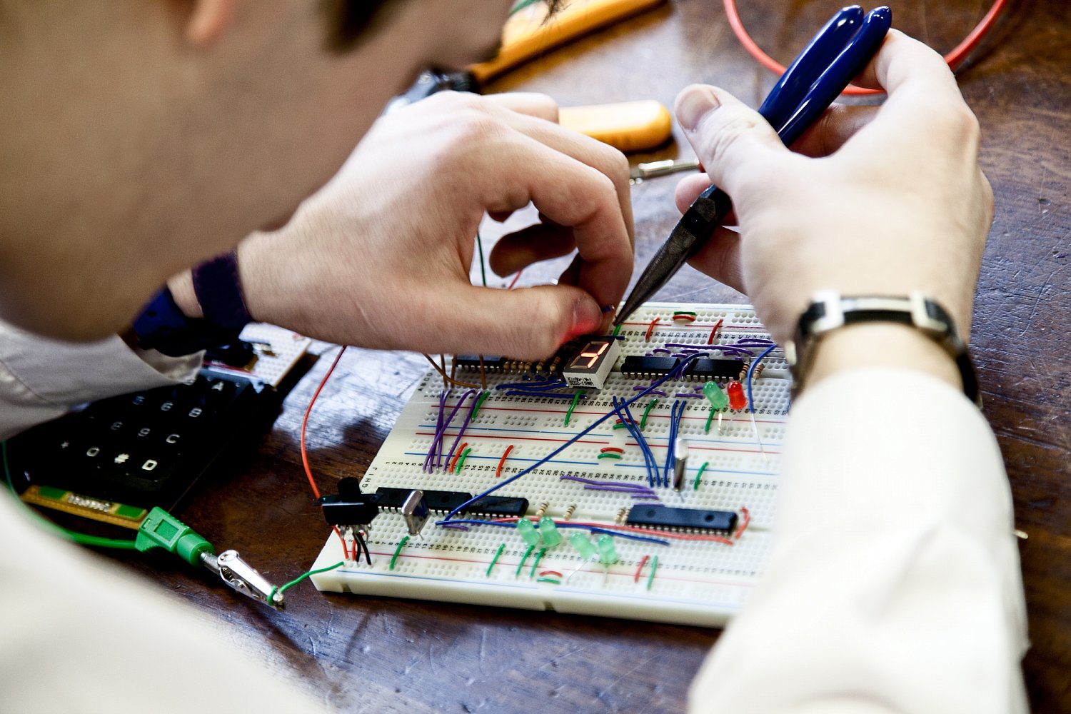 Student working on electronics