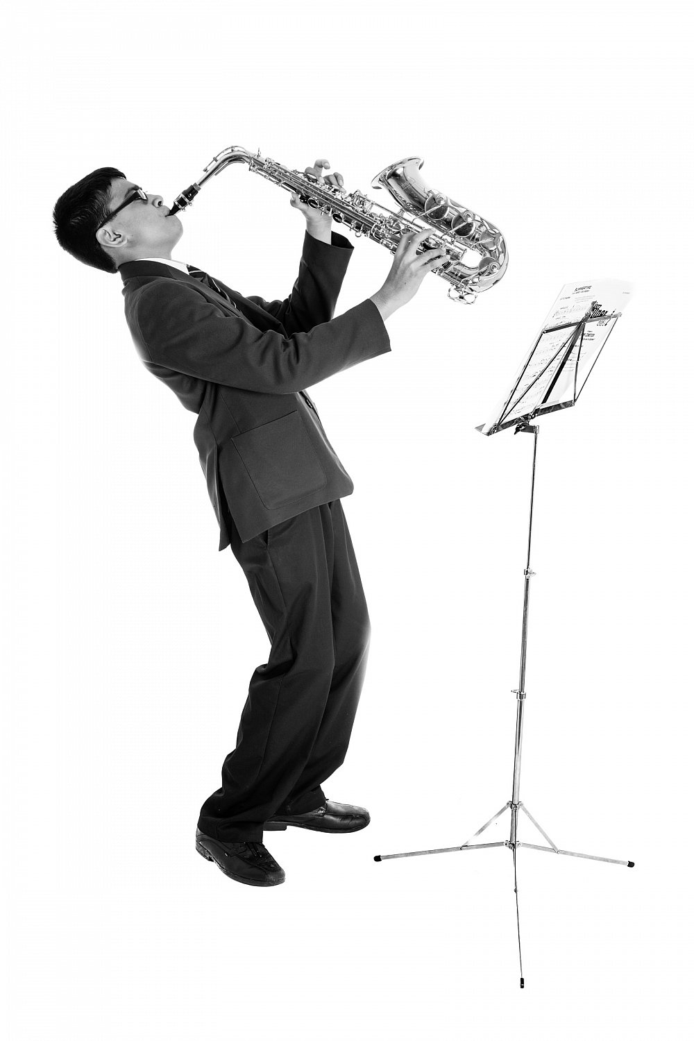 Grammar school student playing the saxophone