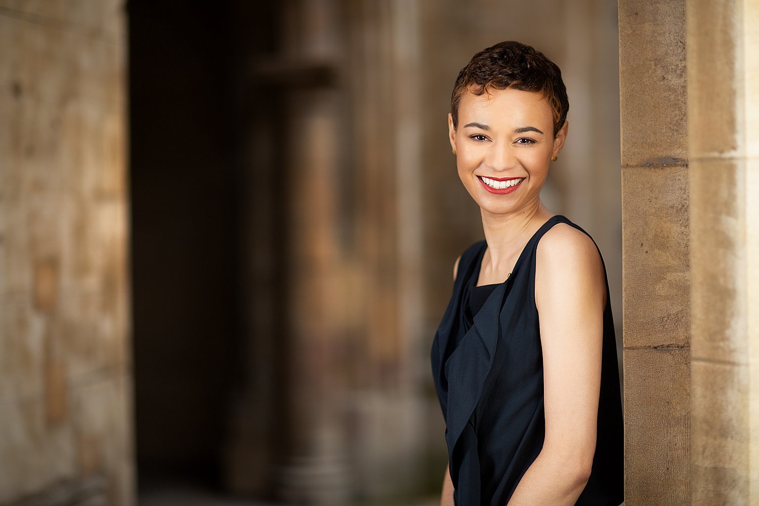 Smiling corporate portrait against London stone