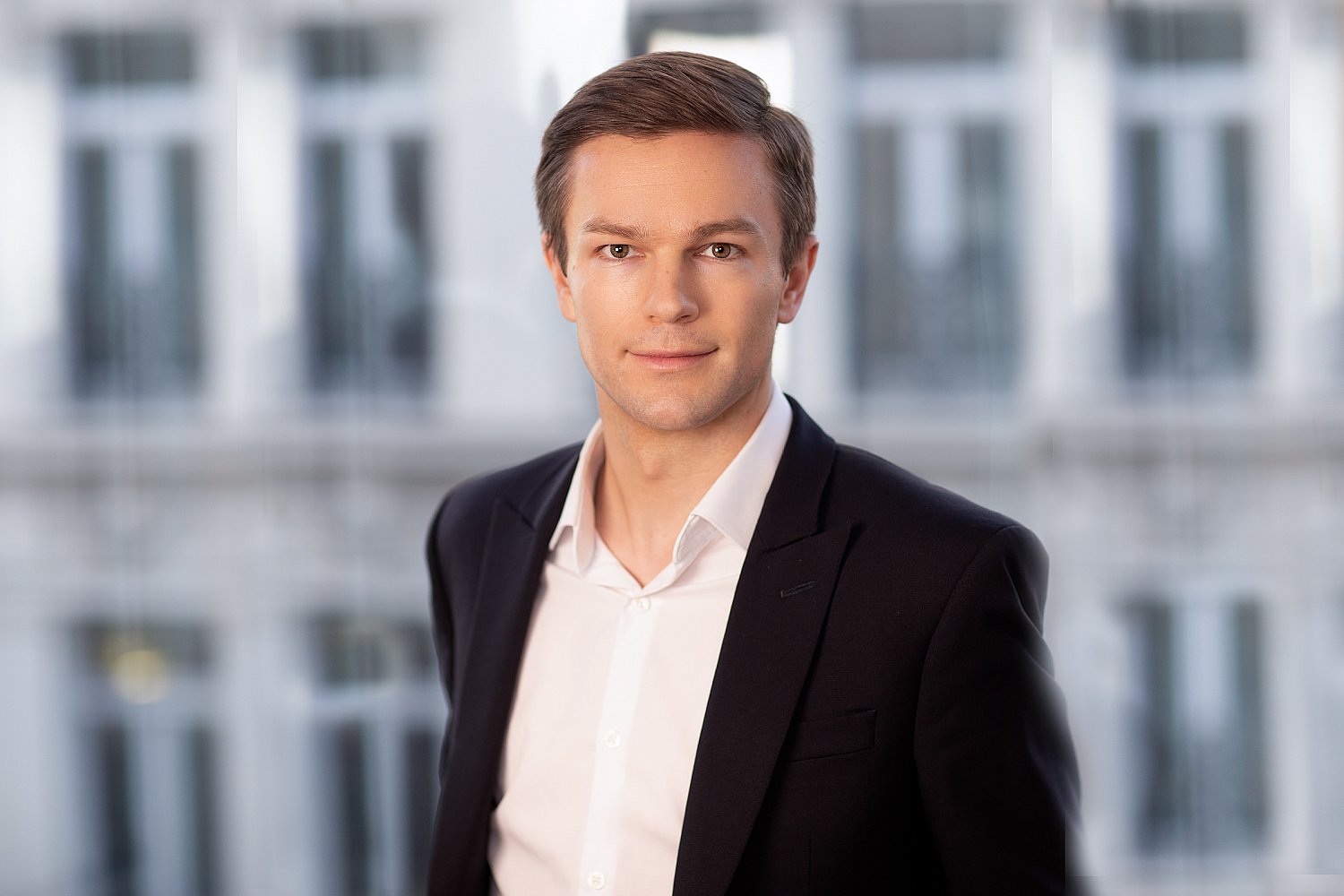 Relaxed portrait of a smart young businessman